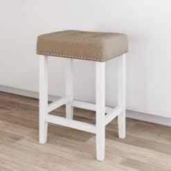 Upholstered Tufted Wood Backless Bar Stool 6 Upholstered Tufted Wood Backless Bar Stool -Nathan James 21311 HERO c75e7891 760c 41d6 9a94 e03c0eed142e