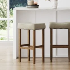 Wood Upholstered Saddle Seat Bar Stool -Nathan James 21403 HERO 2 78f87e15 c43c 4300 83ab 95b8c43f4f6e